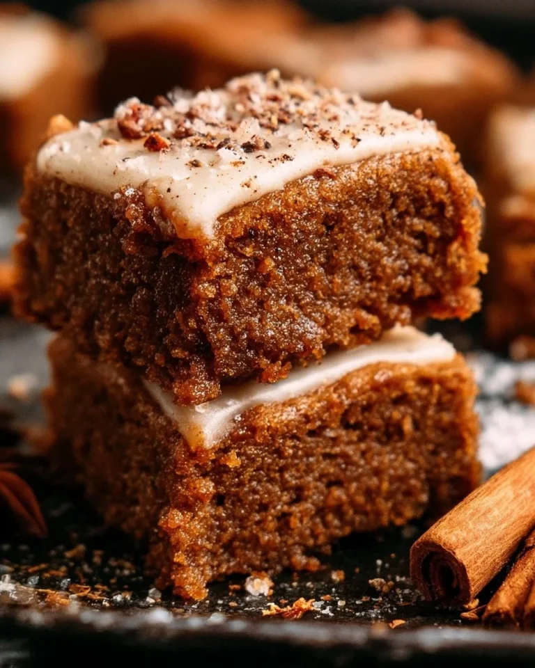 Deliciously soft gingerbread cookie bars served on a festive plate.